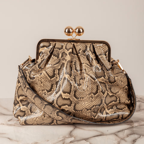 STORY - CLUTCH PITONATA