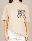 TENSIONE IN - PE260194 - T-SHIRT ASIMMETRICA CON TASCA PAILLETTES AVORIO
