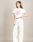 TENSIONE IN - 26M3978 - T-SHIRT LOVE ME LESS TOUCH ME MORE  BIANCO