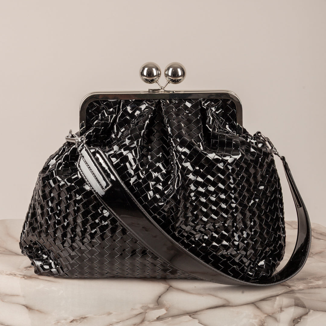 STORY - CLUTCH GRANDE INTRECCIATA IN VINILE