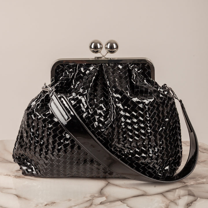 STORY - CLUTCH GRANDE INTRECCIATA IN VINILE