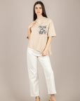 TENSIONE IN - PE260194 - T-SHIRT ASIMMETRICA CON TASCA PAILLETTES AVORIO