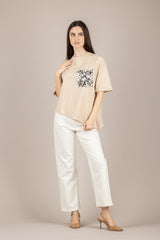 TENSIONE IN - PE260194 - T-SHIRT ASIMMETRICA CON TASCA PAILLETTES AVORIO