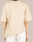 TENSIONE IN - PE260194 - T-SHIRT ASIMMETRICA CON TASCA PAILLETTES AVORIO
